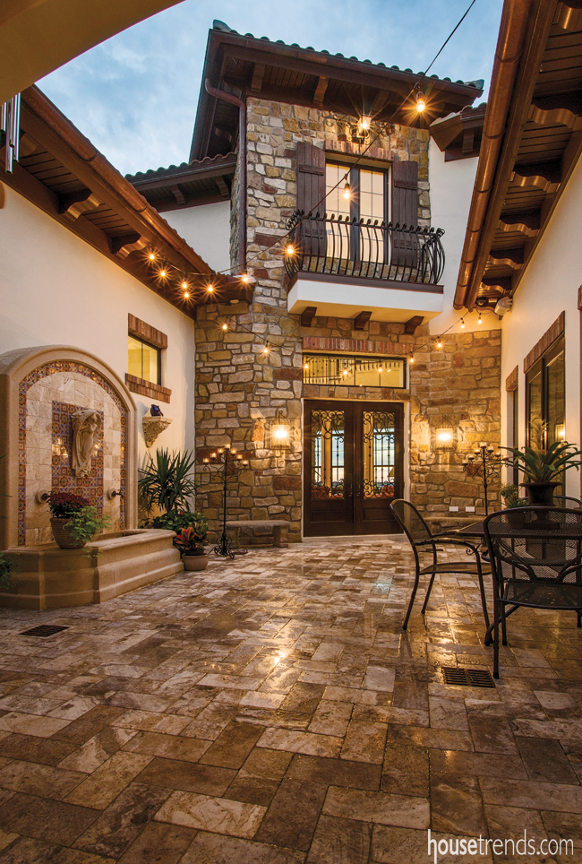 Custom doors lead to a Tuscan-inspired getaway
