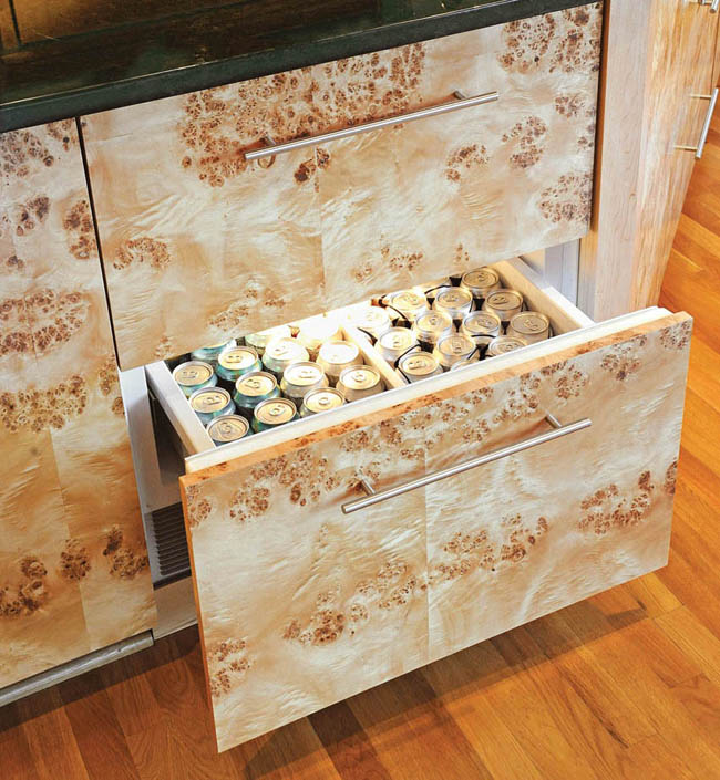 Kitchen island hides convenient sub-zero refrigerator