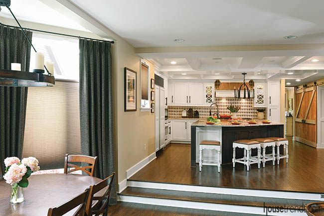Sliding barn doors conceal a pantry