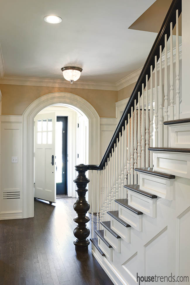 Molding and wainscoting dress up a front entry