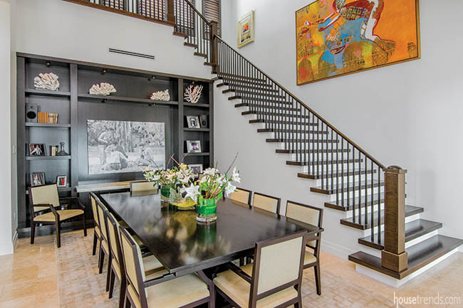 Built-in bookcase adds unique touch to a formal dining room