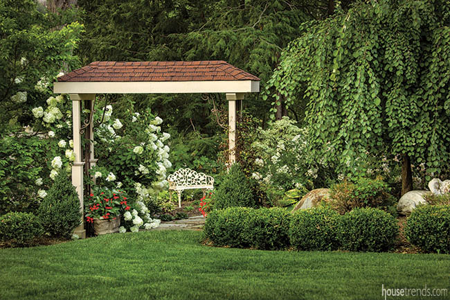 Outdoor seating area thrives in nature