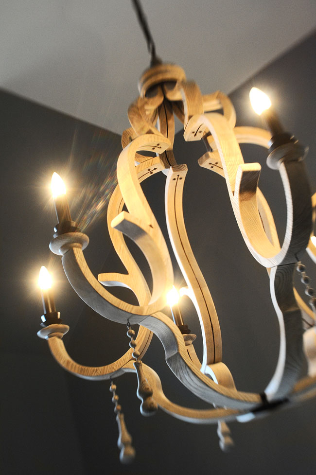 Wood chandeliers pair casual with elegant.