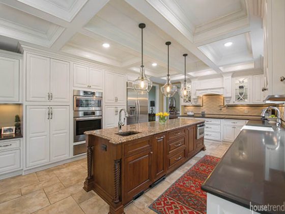 Kitchen island features a microwave drawer