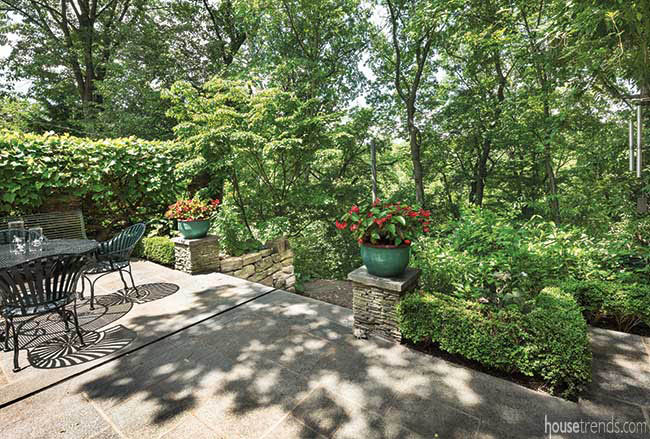 Trees lend privacy to a patio and garden