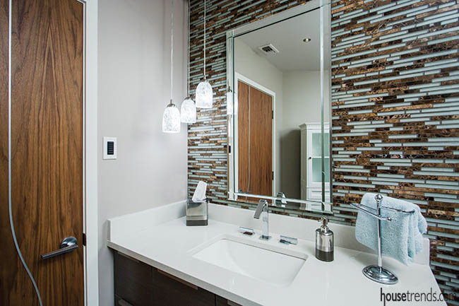 Mosaic tile accent wall wows in a guest bathroom