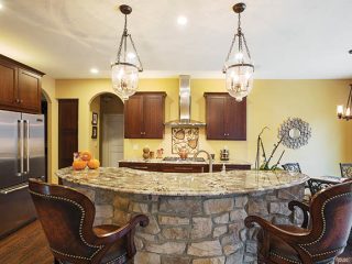Curved island with a rustic feel