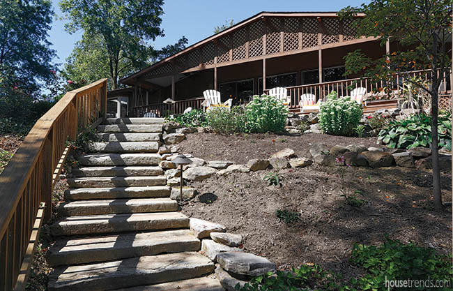 Steps lead guests from a patio to the water