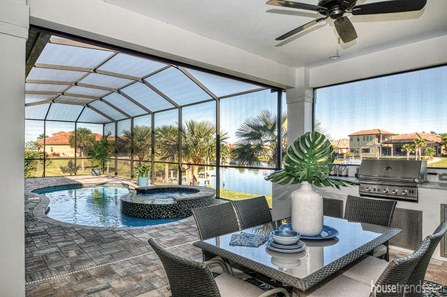 Screened-in lanai with casual dining area