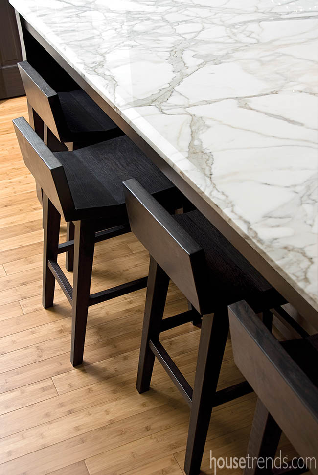 Bar stools match a modern kitchen