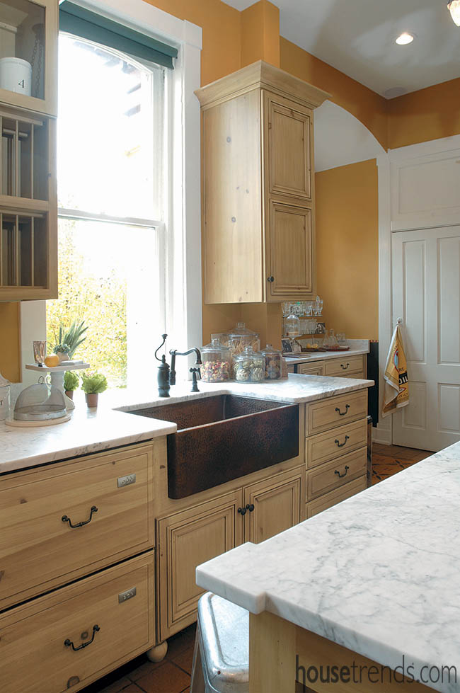 Pine cabinets hide modern conveniences in historic home