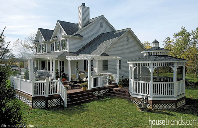 Pergolas throw shade on a cluster of seats