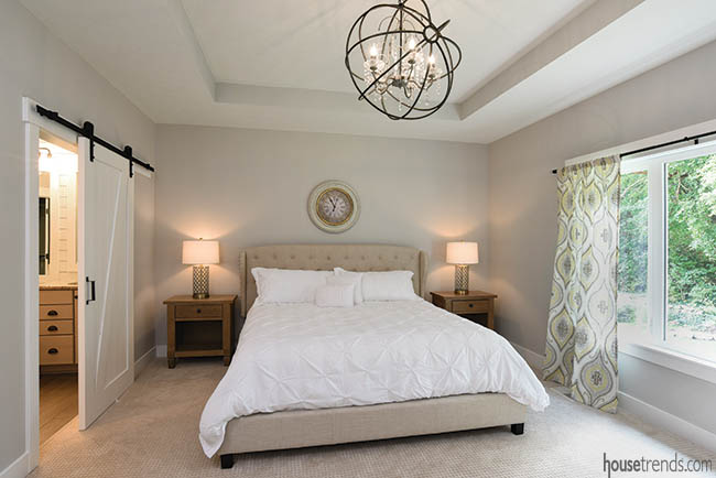 Sliding barn door conceals a bathroom