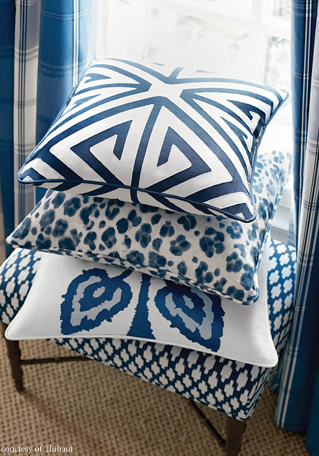 Add a pop of color with navy throw pillows