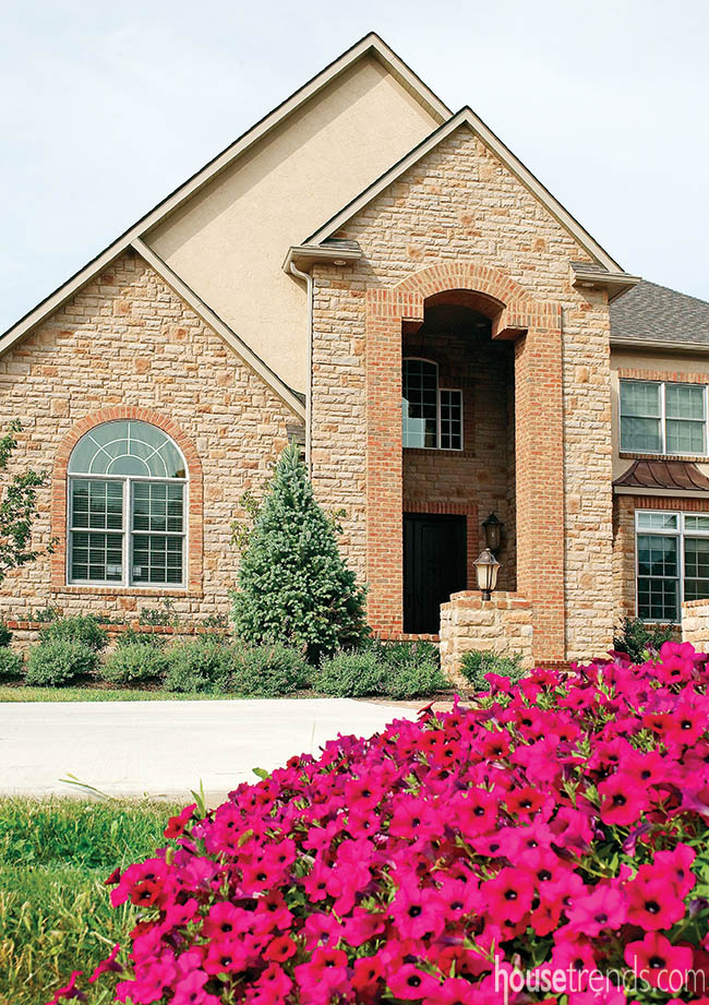 Colorful flowers are scattered throughout a landscape