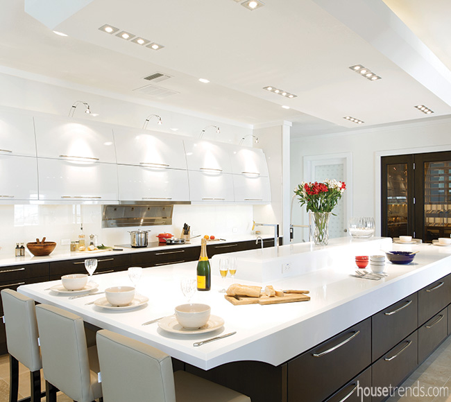 Cabinets stand out in an all-white kitchen design