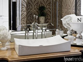 Bathroom mirrors add interest to a powder room