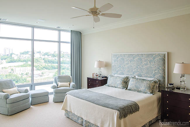 Soft shades of blue complement a relaxing master bedroom