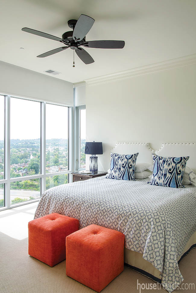 Blue and orange pop in a guest bedroom