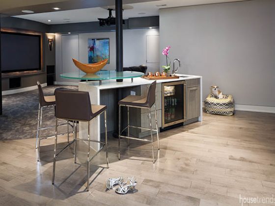Bar stools offer seating around a lower level bar
