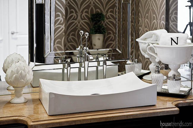 Powder room wallpaper adds interesting texture