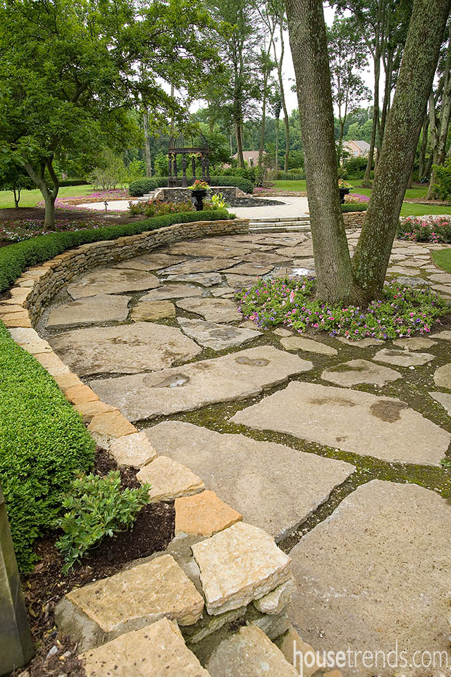 Salvaged limestone slabs find new home in a back yard