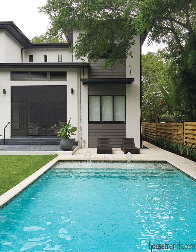 Bubblers and sun shelf add fun to a swimming pool