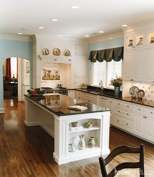 Custom cabinetry adds display space to a charming kitchen