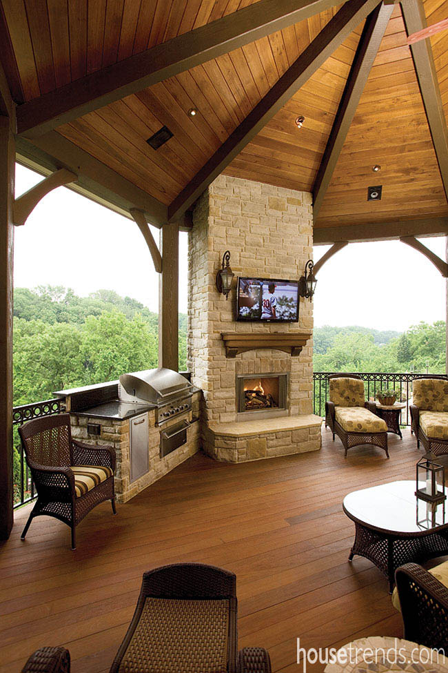 Balcony offers a full outdoor kitchen and gathering space