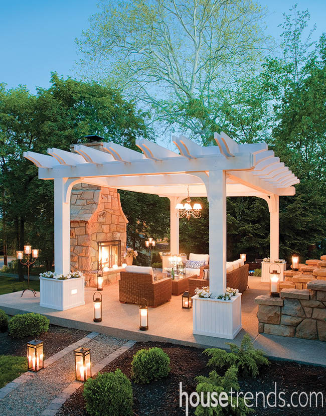 Lanterns lend an exotic vibe to a pergola