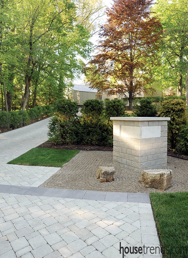 Address marker takes up residence next to a driveway