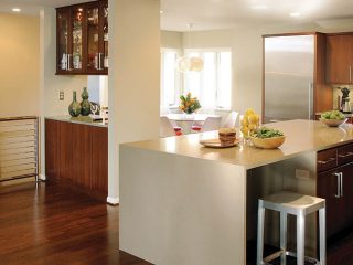 Kitchen island dominates a design