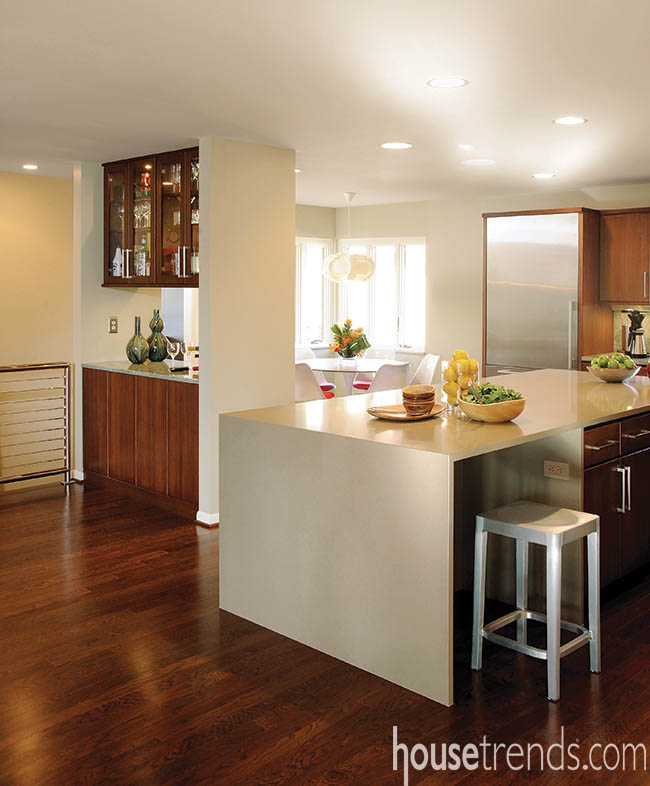 Kitchen island dominates a design