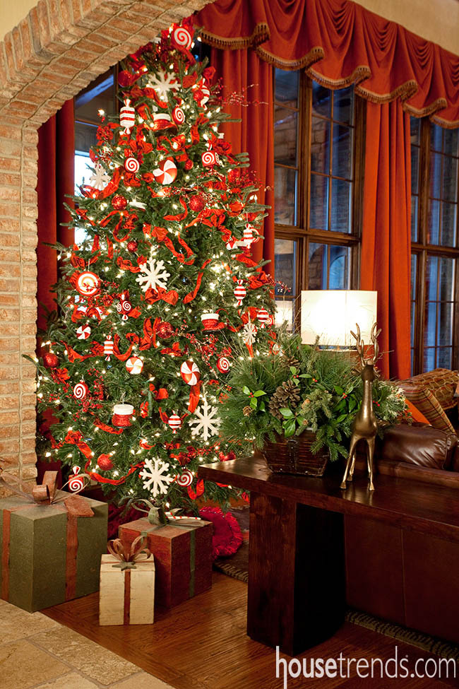 Christmas tree stands proud in a living room