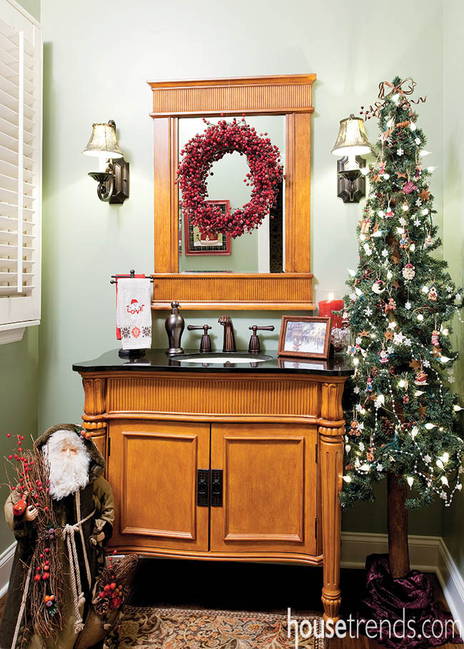Holiday decor makes an appearance in a powder room