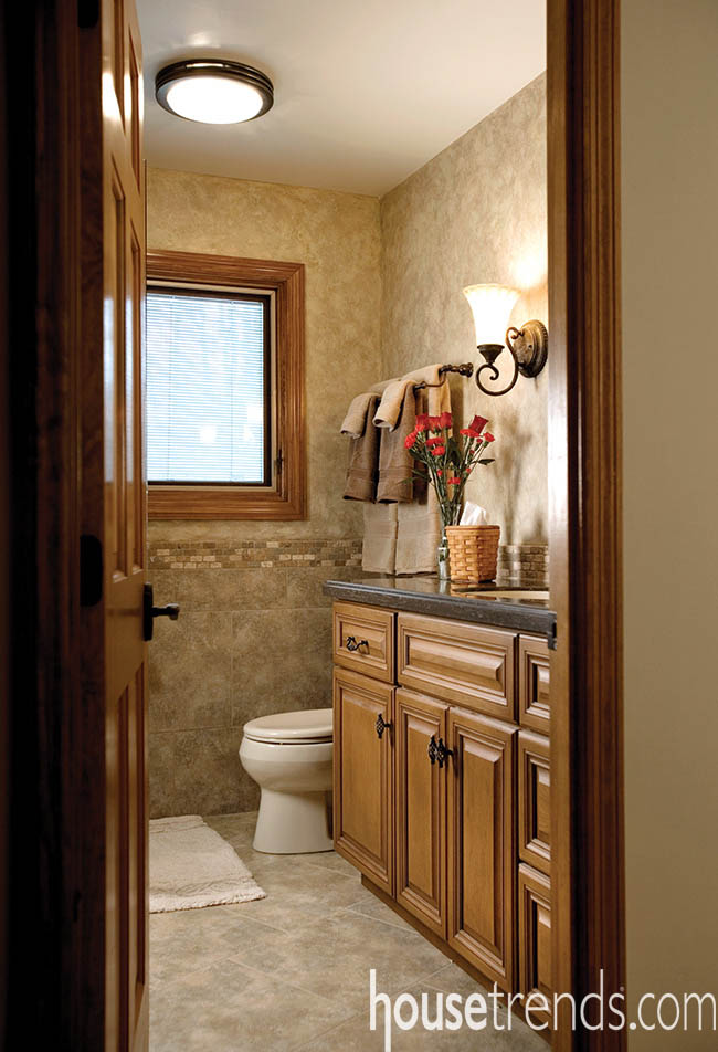 Guest bathroom design mimics the master bath
