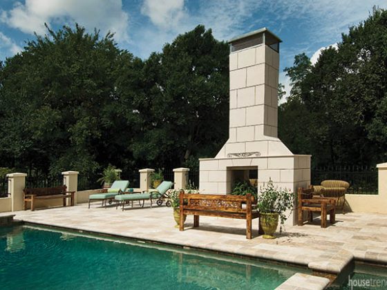 Double-sided fireplace heats up a patio design