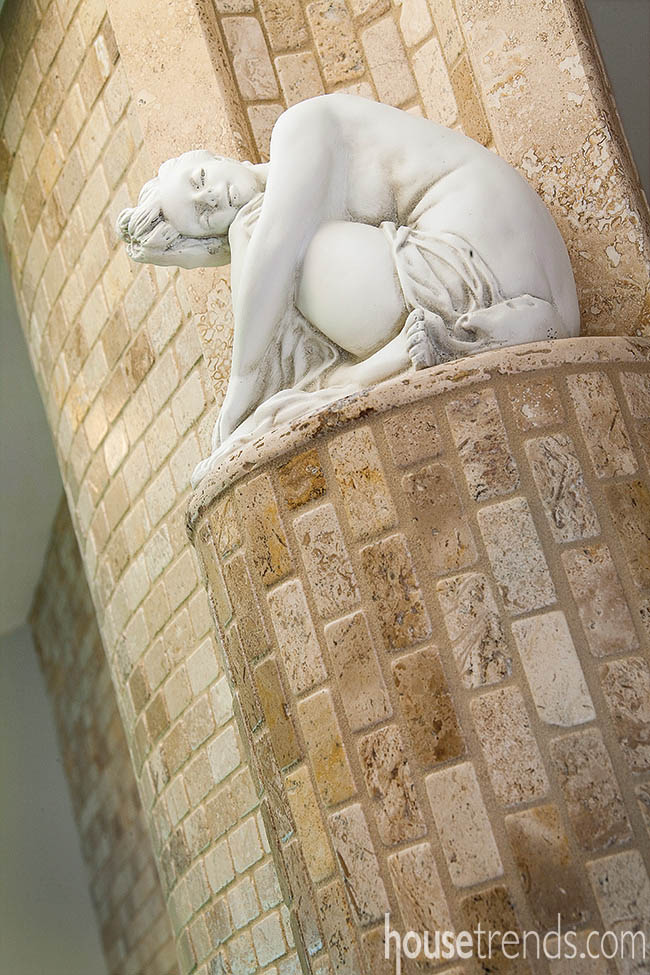 Statue complements a master bath design