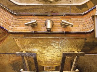 Dramatic vessel bowl sink dazzles guests