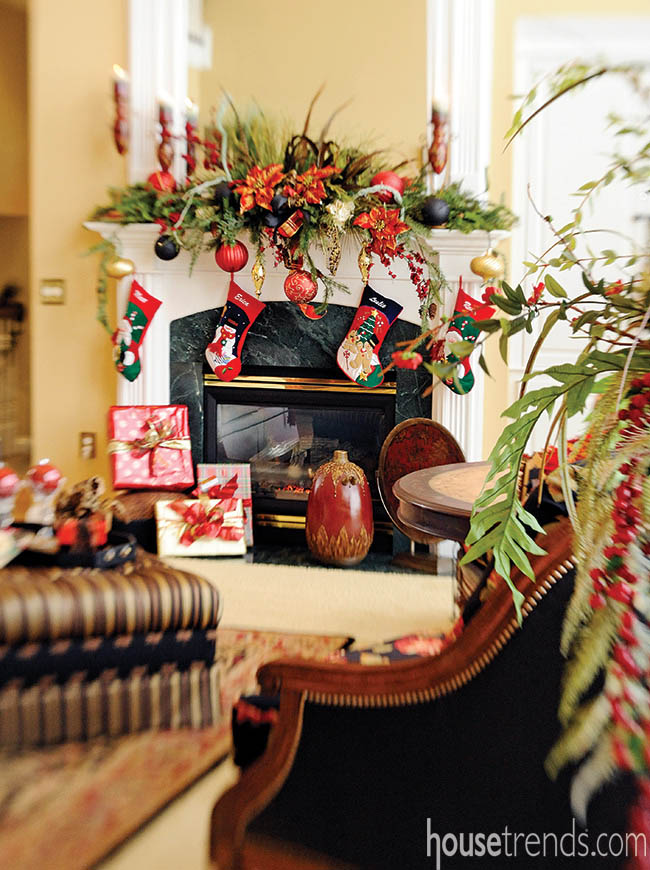Fireplace mantel gets festive decorations for the holidays