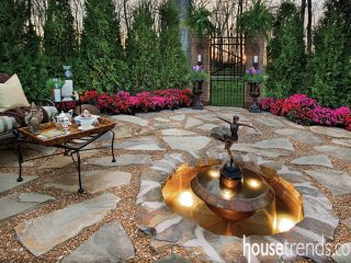 Outdoor water fountain sparkles in a garden design