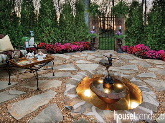 Outdoor water fountain sparkles in a garden design