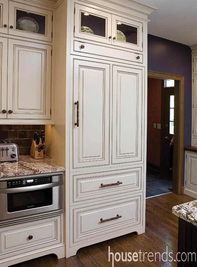 Custom panels hide a refrigerator