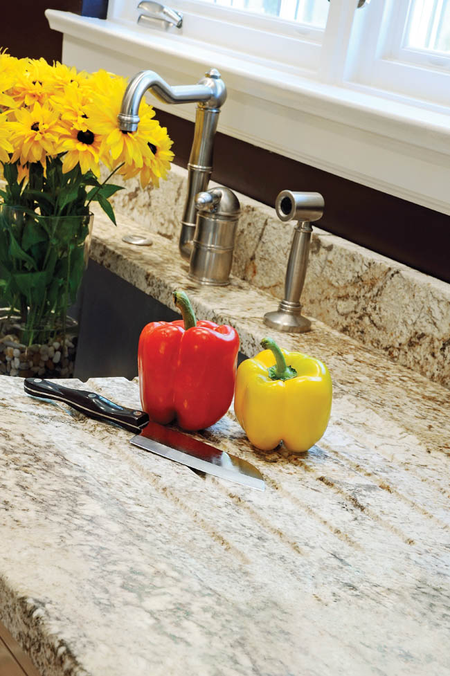 Granite countertops complement the kitchen design