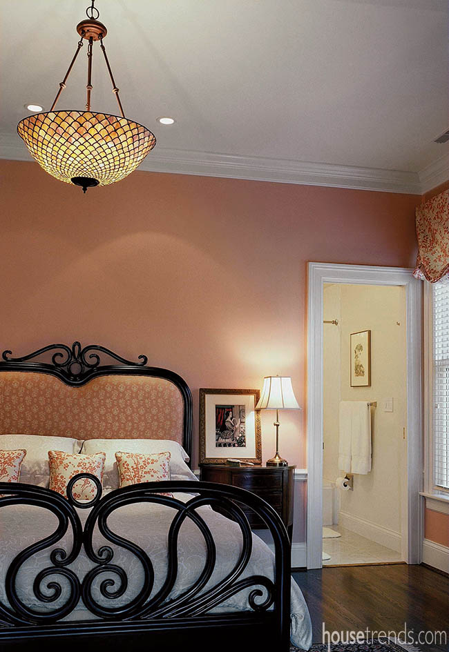 Lighting adds glamour to a guest bedroom design