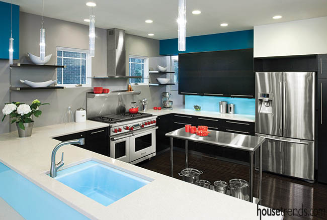 Cabinetry and glass backsplash combine for a custom look