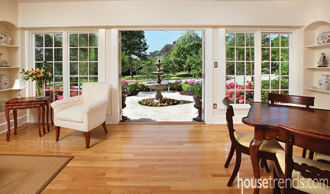 Doors open up to an elegant garden