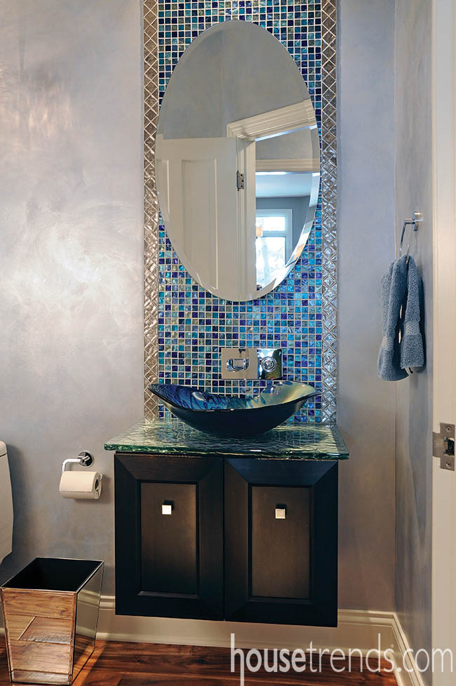 Colorful mosaic tiles stretch to the ceiling