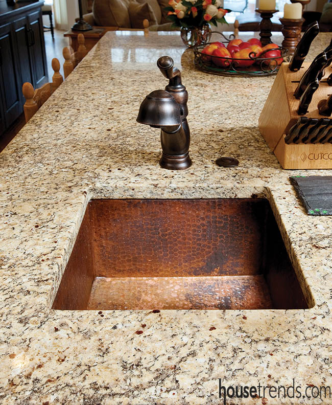 Copper prep sink matches nearby main sink