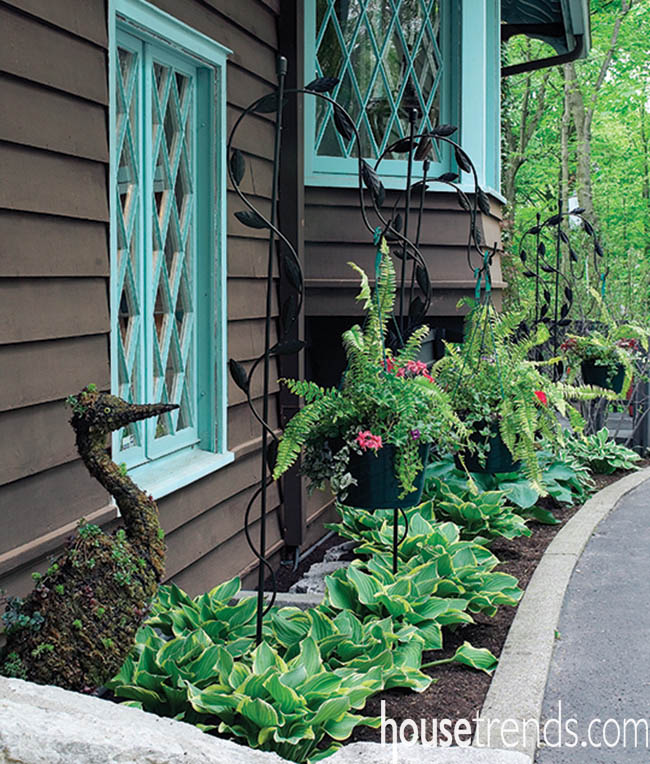 Flowerbed plays host to an elegant topiary